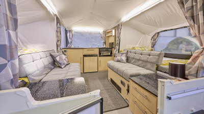 Conway Countryman interior, grey upholstery, light wood, central lounges, bedrooms either side, rear kitchen