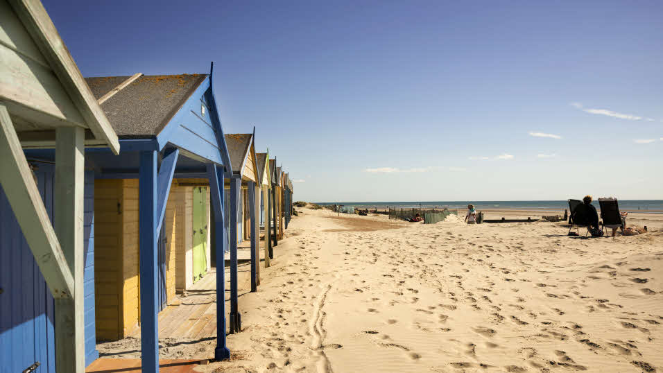 beach huts at sandy West Wittering Beach, West Sussex