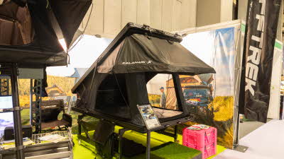 The TUFFTREK® Kalahari-X has brown and black canvas with a matching hard shell roof.  The door and windows open fully as shown.