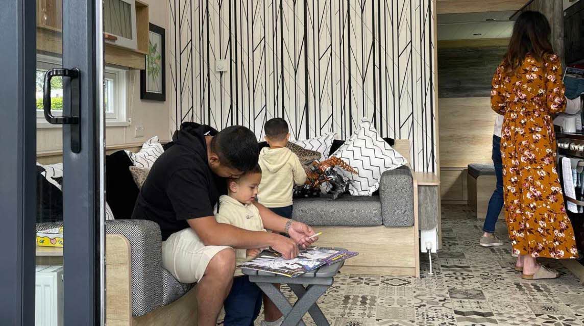 family in glamping cabin
