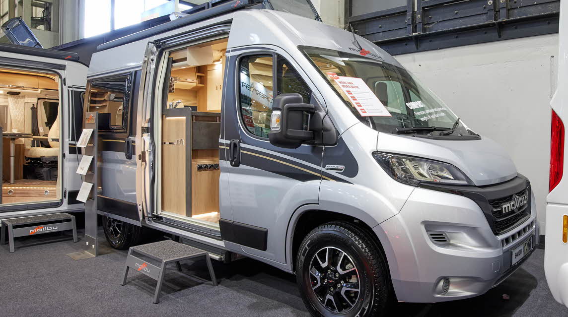 Van Conversion, silver exterior, black graphics