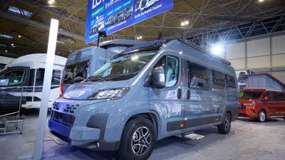 The Swift Carrera 184 is grey with black trim, it's habitation step is extended. 