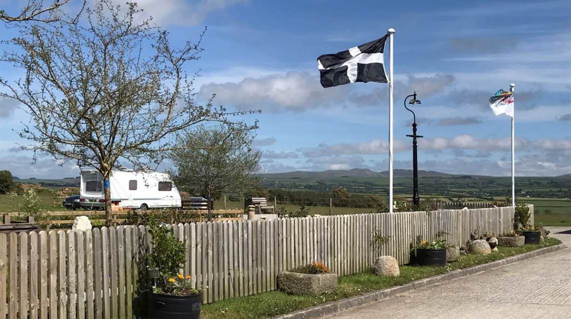 Dunree Certificated Location, PL33 9DY, Cornwall, Camelford, CL owner, 2020, pitch, caravan, flag, fence