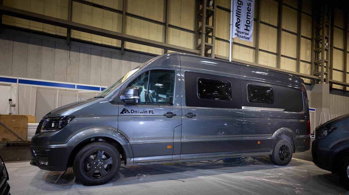 The Rolling Homes Camper Ltd Darwin FL has a dark grey exterior with black trim.  