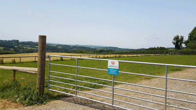 Waterloo Farm, PL15 8LL, Launceston, Cornwall, CL owner, 2022, pitch, field, grass, gate, CAMC signpost, entrance