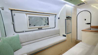Leisure Pods Ltd Campod O2 interior, white upholstery, lounge and kitchen