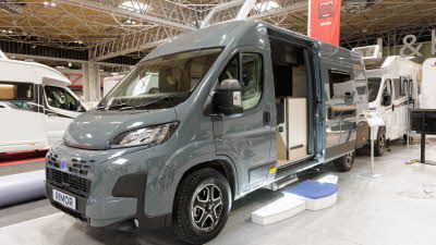 The Rimor Horus 95 is great, its skylight is open.  There is a large step in blue and white beside the closed sliding door.