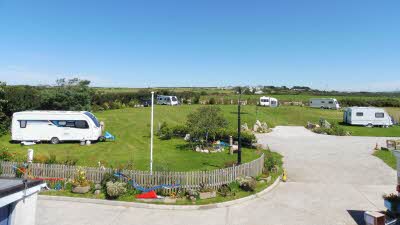 Dunree Certificated Location, PL33 9DY, Cornwall, Camelford, CL owner, 2020, pitch, grass, site, field, trees, fence, awning