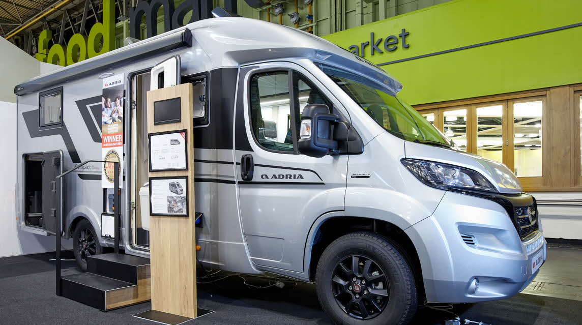 Coachbuilt motorhome, silver, Adria