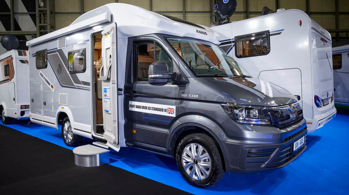 Coachbuilt exterior, grey cab, white body, grey graphics