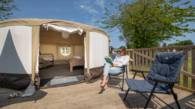 Experience Freedom, canvas yurt, woman reading