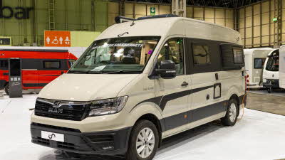 The Mega Mobil Mega Classic 600 S Hubbett is cream with black decals.