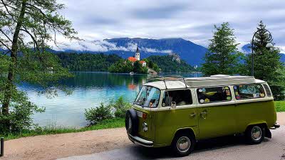 Campervan in front of Lake Bled in Slovenia