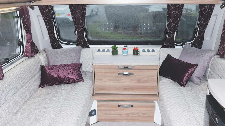 Interior storage and seating at rear of caravan