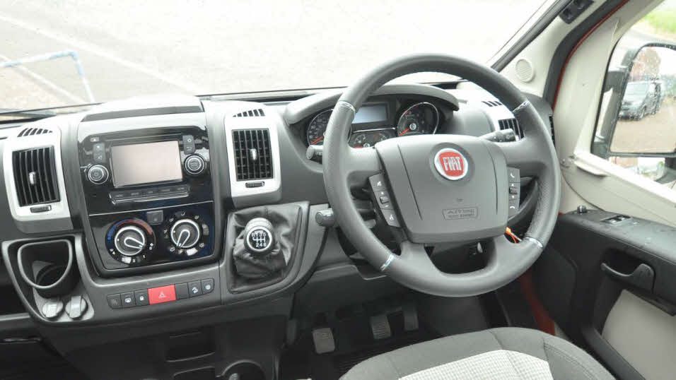 Fiat steering wheel and dashboard, with air con controls