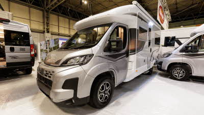 The Auto-Sleeper Broadway EL has a two tone silver/grey cab with a white coachbuilt body.  It has black, grey and bronze decals.