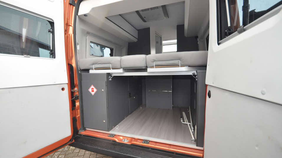 Under bed storage accessed through back of van