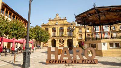 Square in Haro, Spain, with sign naming it the Capital of Rioja