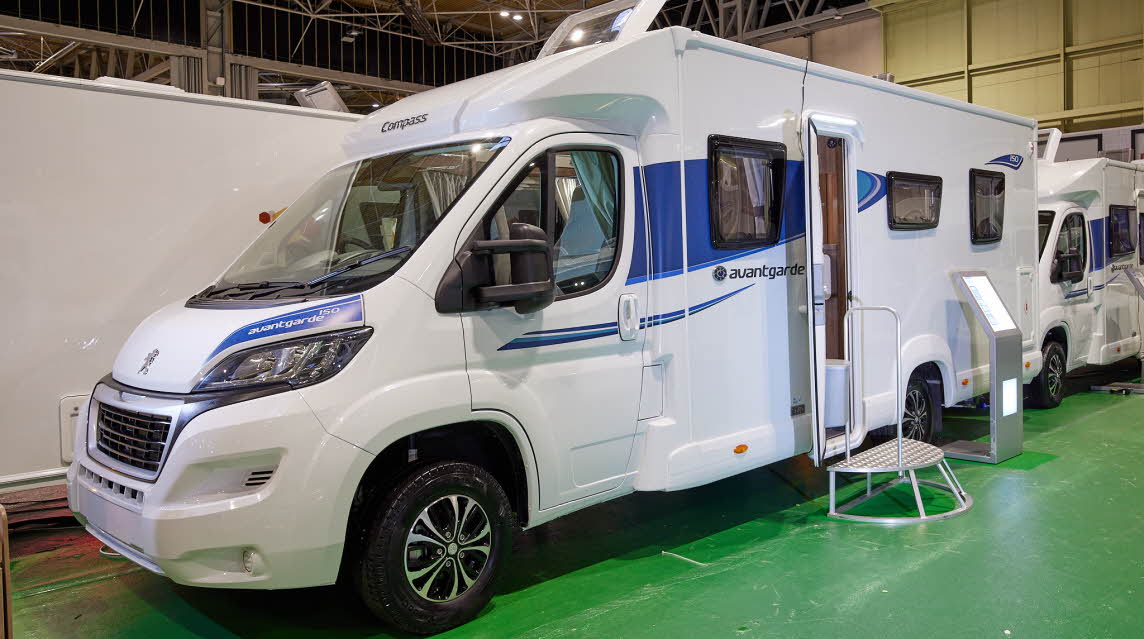 Coachbuilt exterior, white with blue stripe