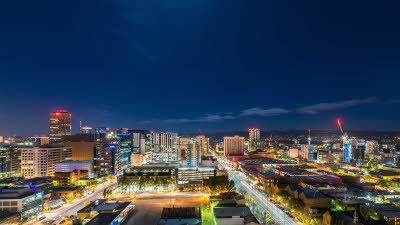 Adelaide city at night with the city lights glowing under the dark sky