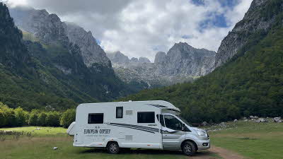 Big European Odyssey motorhome parked in front of mountains in Montenegro