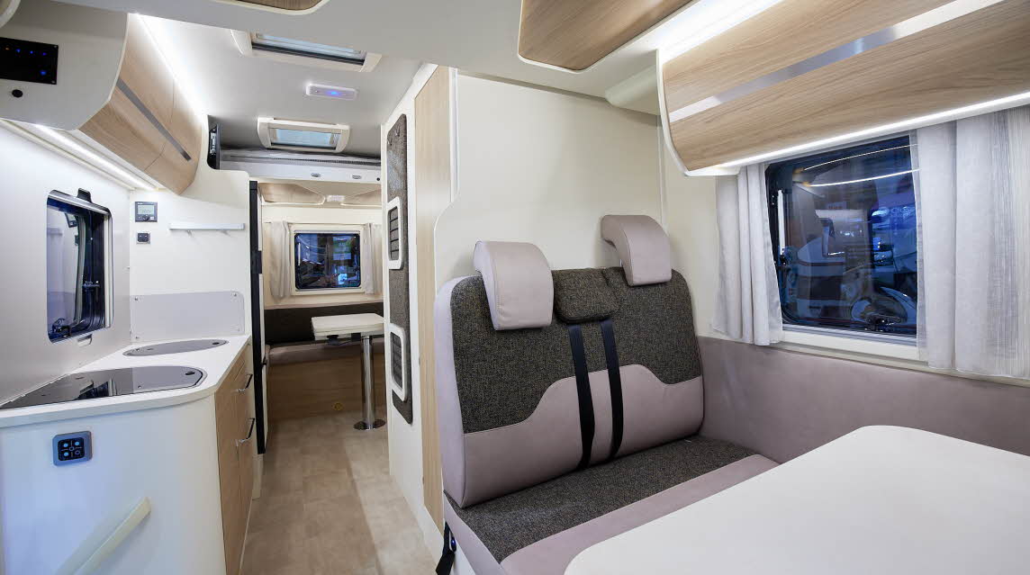 White interior, wooden furniture, grey upholstery