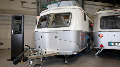 Eriba Touring 560 exterior, front window, white/silver exterior, gold a frame, pop top roof