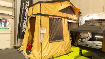The TUFFTREK® Pro Ruggedised 1.6 has yellow canvas with a black roof, it has two windows and its door is open.
