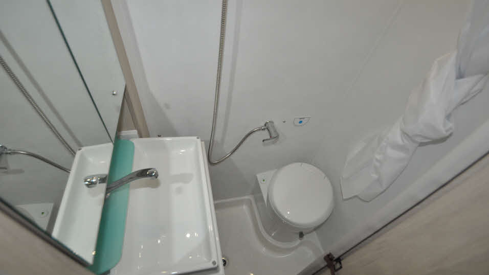 Small washroom with sink and toilet