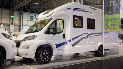 The Rimor Super Brig 95 Plus is white with blue and grey decals. 