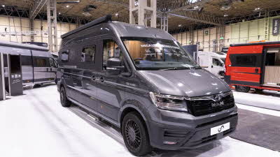 The Mega Mobil Mega Lounge 680 S Twin is grey with a white compass decal.  