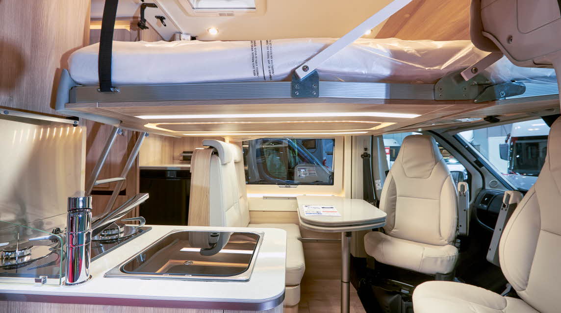 Drop down bed, kitchen, cream upholstery, kitchen sink