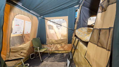 Trigano Camptrail 750 interior, blue/beige canvas, bed compartment, ladder