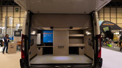 The RP Motorhomes Rebellion 2 has a large boot, with cupboards and a blue control screen.  The boot of the Rebellion lifts upwards.