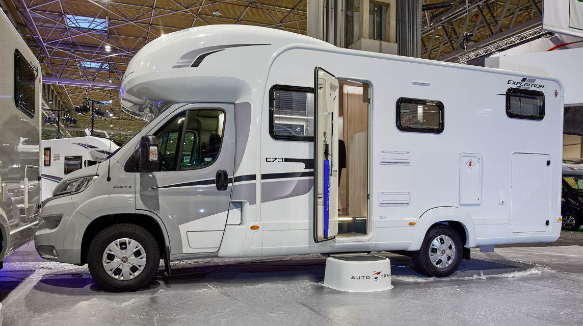 Coachbuilt exterior, pale grey cab