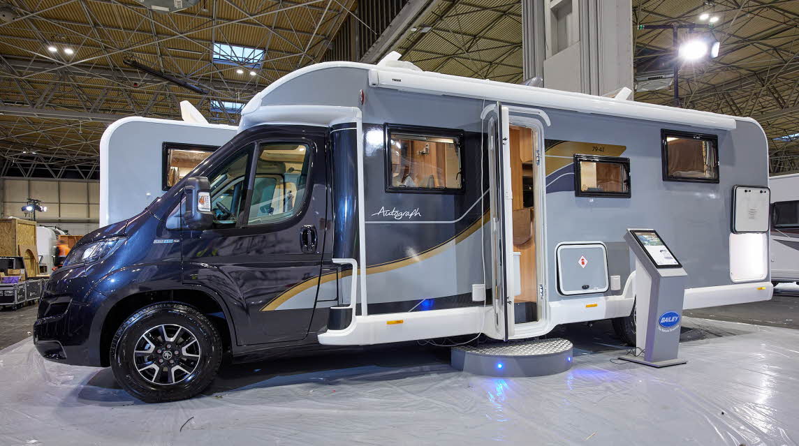 Coachbuilt, dark blue cab, grey body