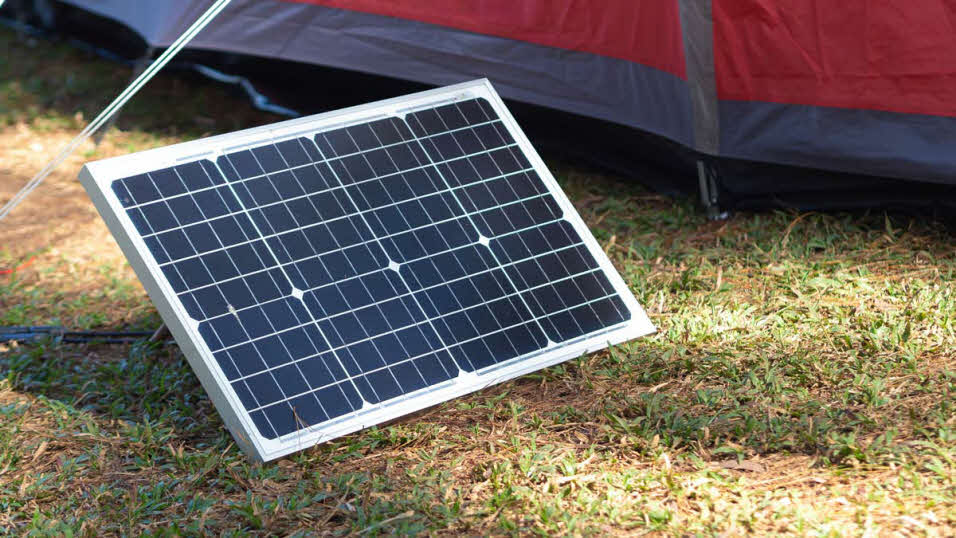 Portable solar panel on a campsite