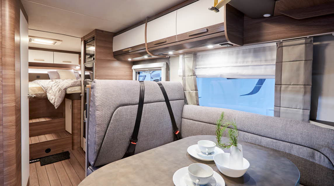 Grey upholstery, rear fixed bed