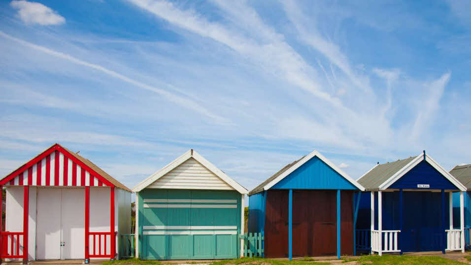 Colourful and quirky beach huts along Sutton Beach, Lincolnshire