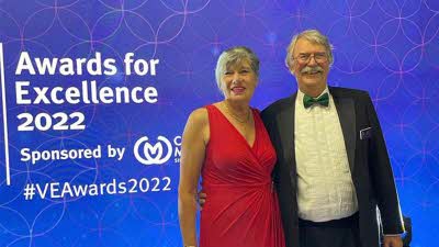 Man and woman at awards ceremony