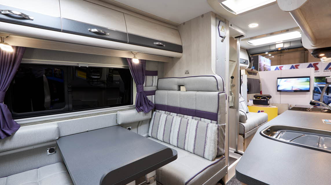 Fairford Plus, stripy upholstery, grey table, purple curtains