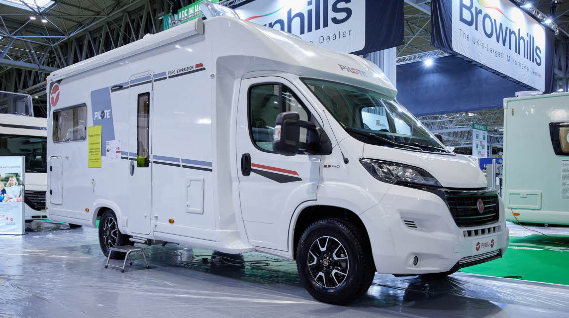 Coachbuilt exterior, white, red graphics