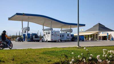 a petrol station in Morocco with a modern curving canopy