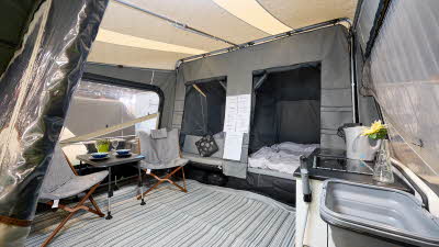 Camp-let Passion interior, two bedrooms, kitchen unit, stripy groundsheet