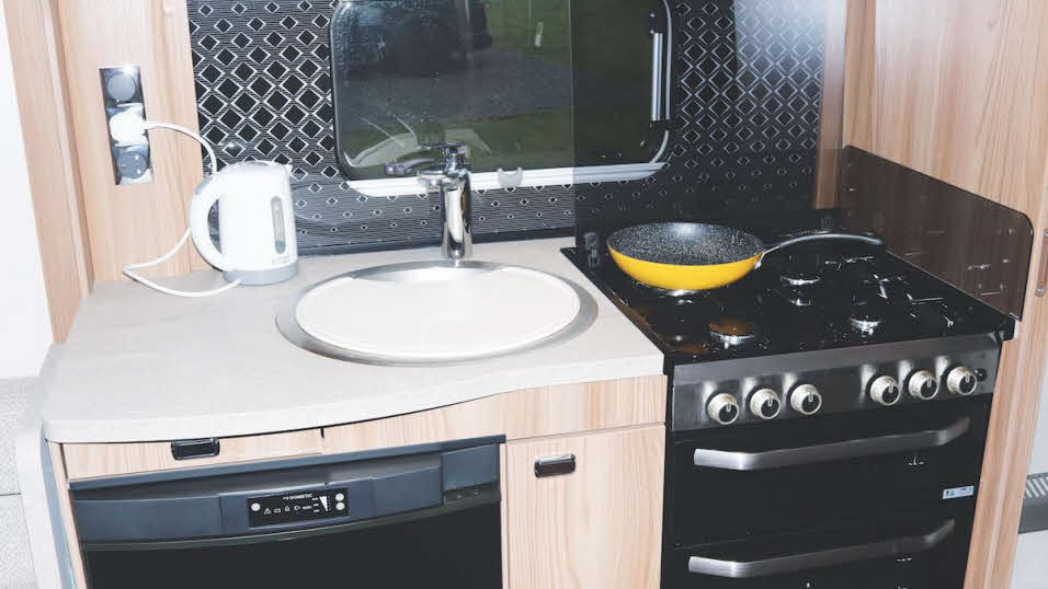 Sink, hob, kettle and microwave