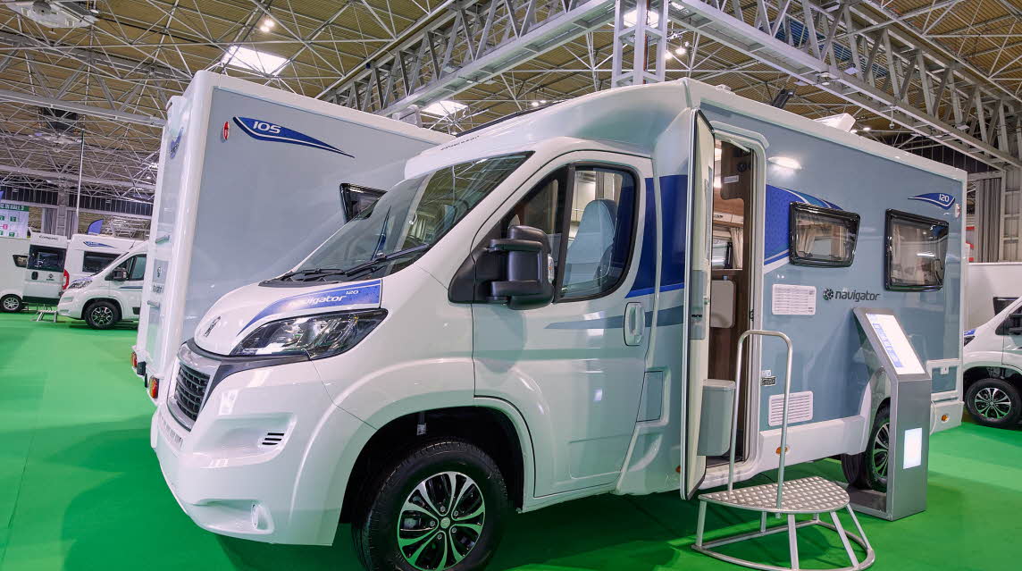 Coachbuilt exterior, white cab, grey body
