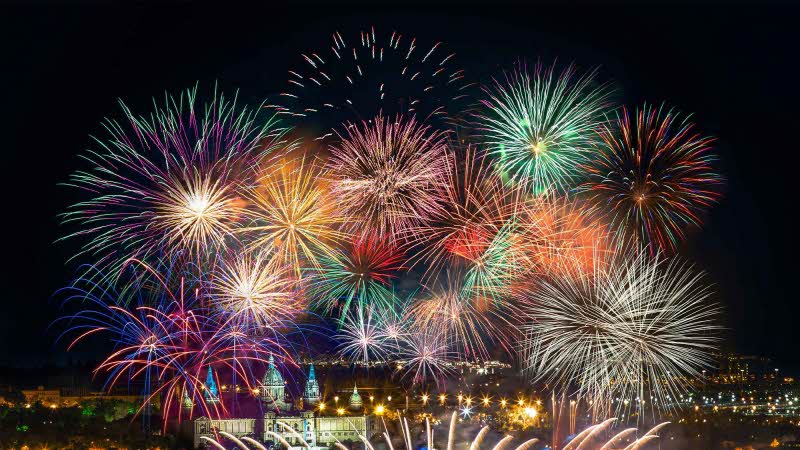 A hilltop view of the fireworks show at Montjuïc in Barcelona, Spain, for the 2023 La Mercè holiday