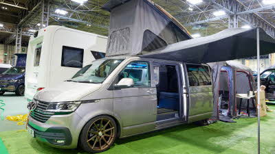 Campervan exterior, silver, raised roof, awning