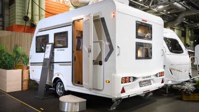 Weinsberg CaraOne 400 LK Bunks' exterior is white with brown and gold graphics.  There are two windows in the rear panel for the bunk occupants to enjoy the view.