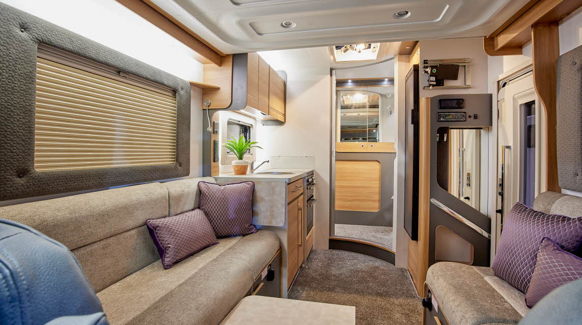 Beige and tan upholstery, wooden furniture, carpet
